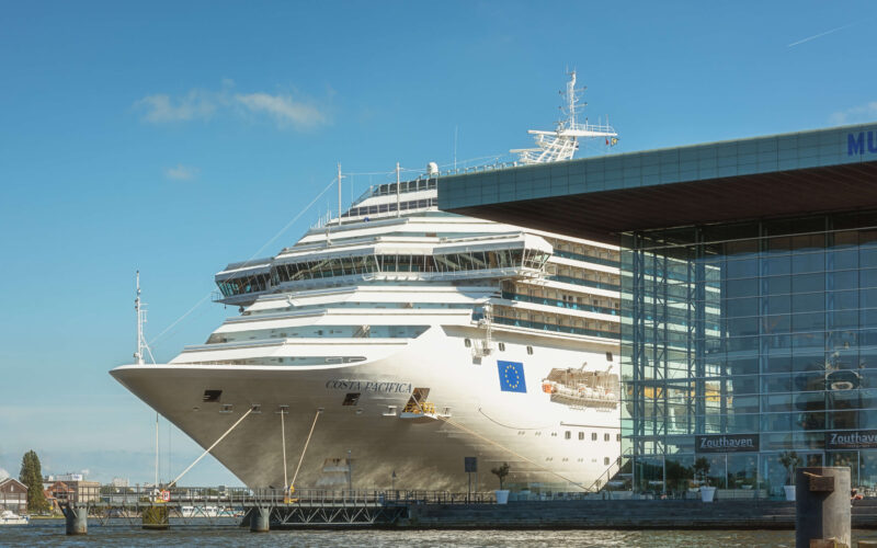 Costa Pacifica cruise ship docked at the Passenger Terminal Amsterdam (PTA) alongside the modern terminal building with Zouthaven restaurant, Amsterdam