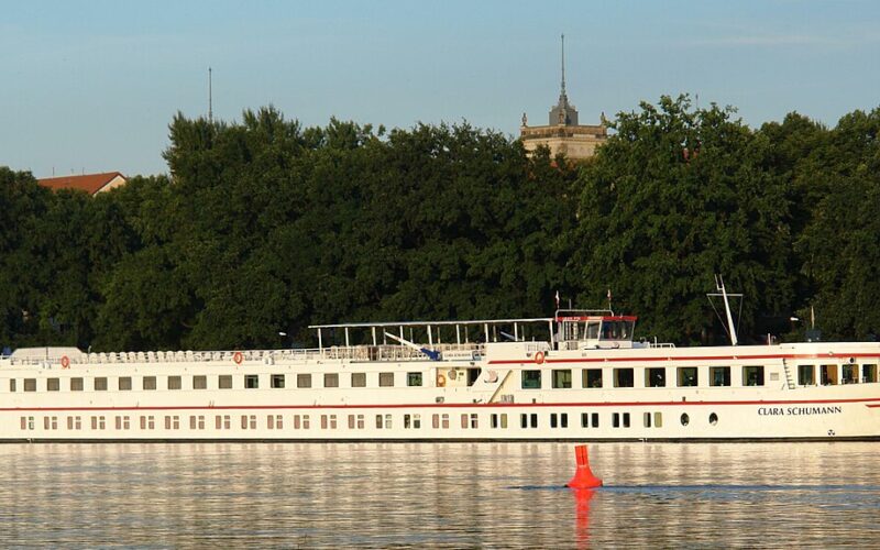 River cruise ship moored at a quay in Amsterdam near the city centre