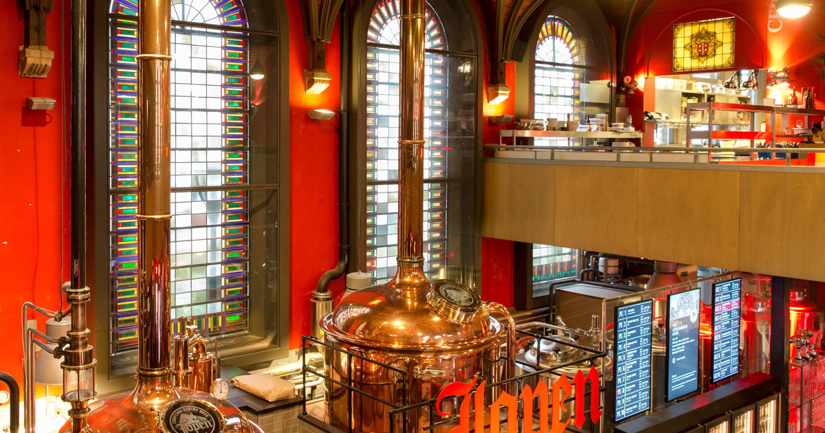 Copper brewing kettles and stained glass inside the Jopenkerk, Haarlem’s brewery in a former church